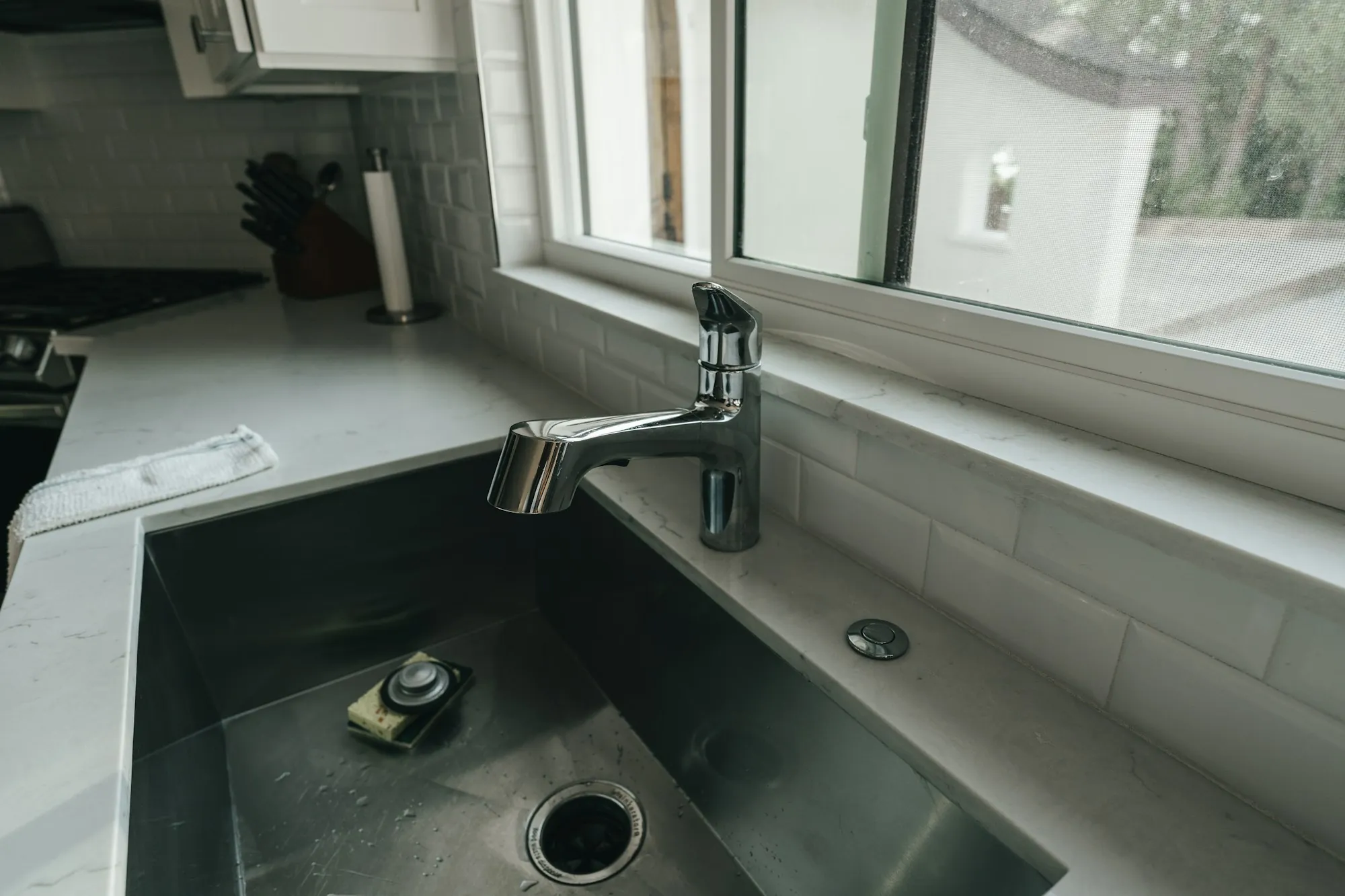 Water Filtration and Treatment Services in Fountain Valley Kitchen sink with a chrome faucet