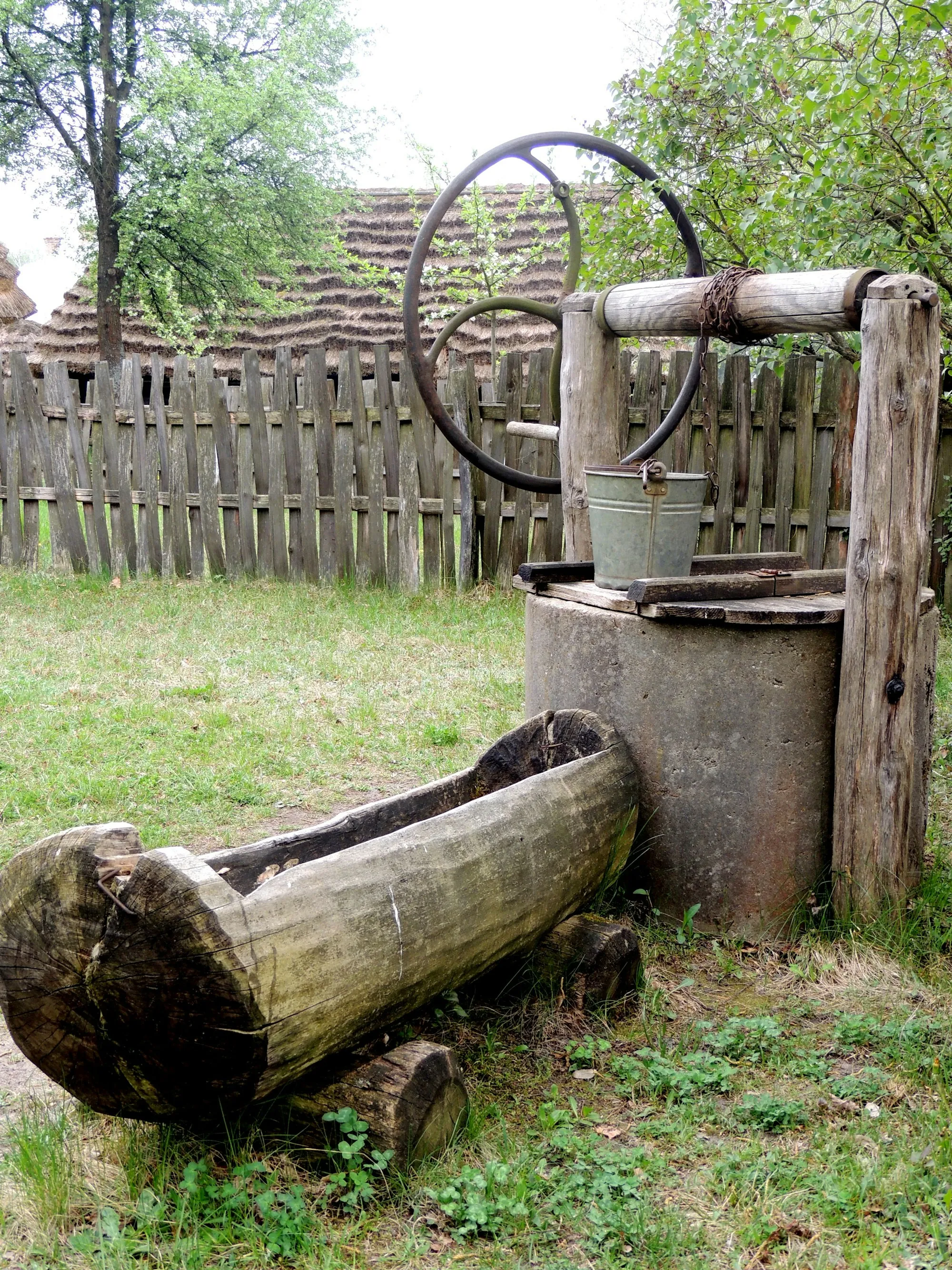 Well Water Filtration & Treatment in Fountain Valley Old wooden well with a bucket