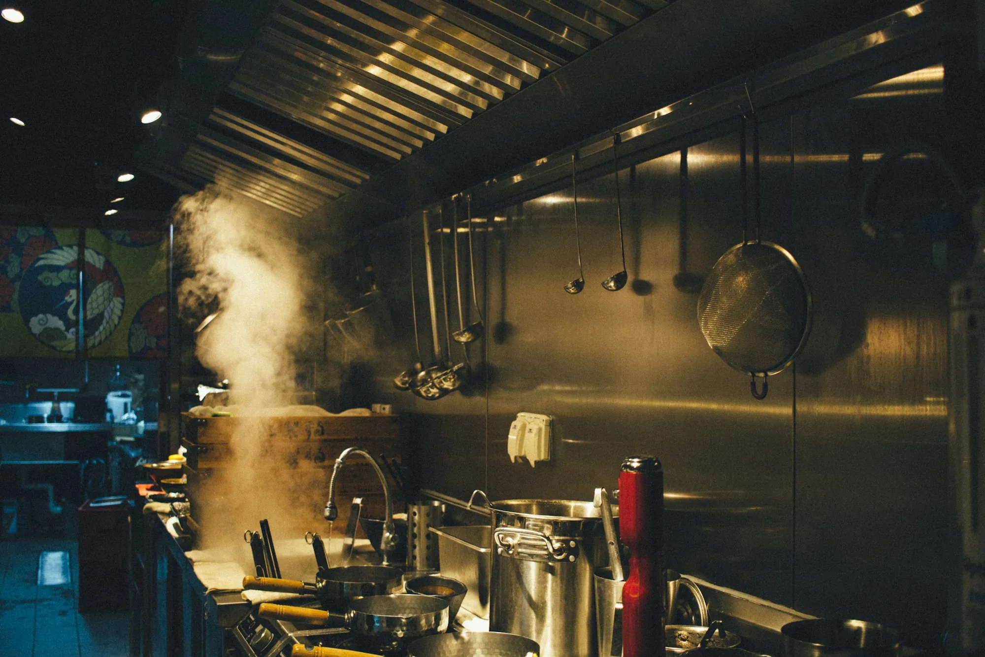 Commercial Water Filtration in Fountain Valley Stainless steel cooking pots in a commercial kitchen